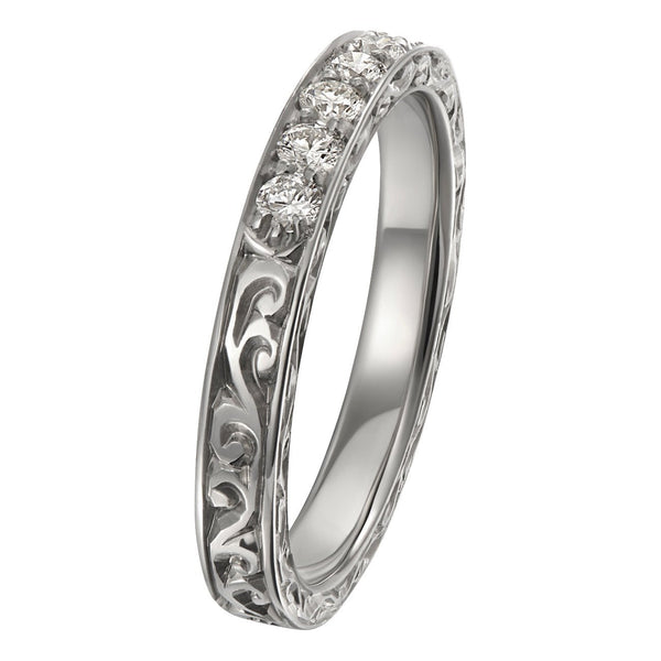 Diamond wedding band with engraved scroll pattern in platinum