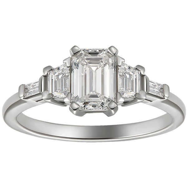 Emerald cut engagement ring with trapezoid side stones