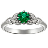 Emerald and Diamond Floral Motif Platinum Ring