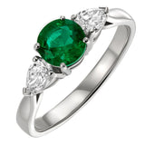 Emerald and diamond three stone ring with round emerald and pear shape diamonds