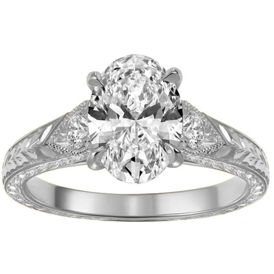 Oval lab grown diamond engagement ring with laurel engraved pattern