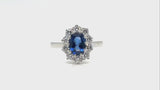 Antique sapphire and diamond cluster ring in platinum with oval cushion blue sapphire