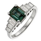 Teal sapphire ring in platinum with baguette diamonds