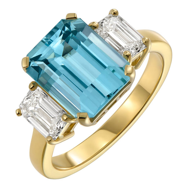 Three stone aquamarine and diamond ring with flat profile and yellow gold band