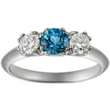 Three stone aquamarine engagement ring with diamonds in platinum