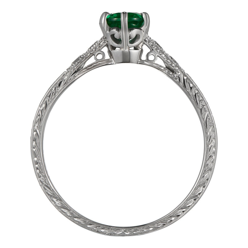 Unusual emerald ring with diamonds and laurel engraving in platinum