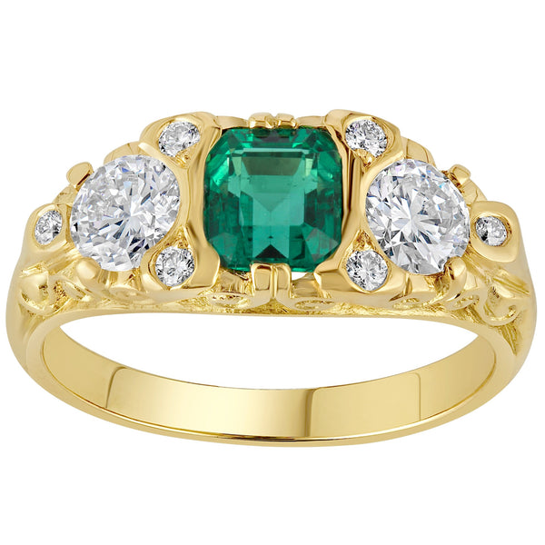 vintage emerald and diamond carved ring in yellow gold