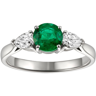 Vintage emerald engagement ring with pear shape diamonds in platinum