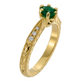 Vintage round emerald engagement ring with diamonds in yellow gold