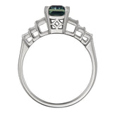 Vintage style emerald cut teal sapphire and diamond ring in platinum