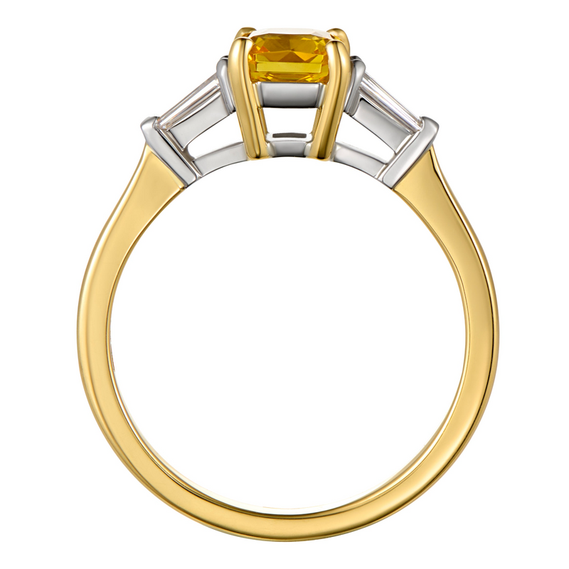 Vintage style yellow sapphire ring with tapered baguette diamonds and platinum and gold band