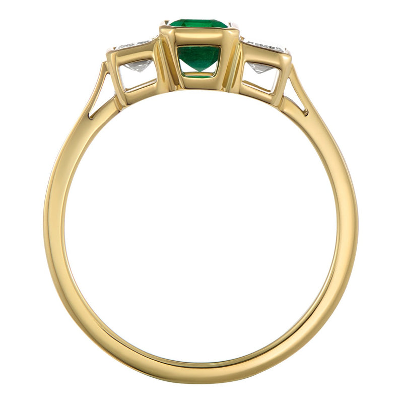 Yellow gold trilogy emerald ring with diamond side stones